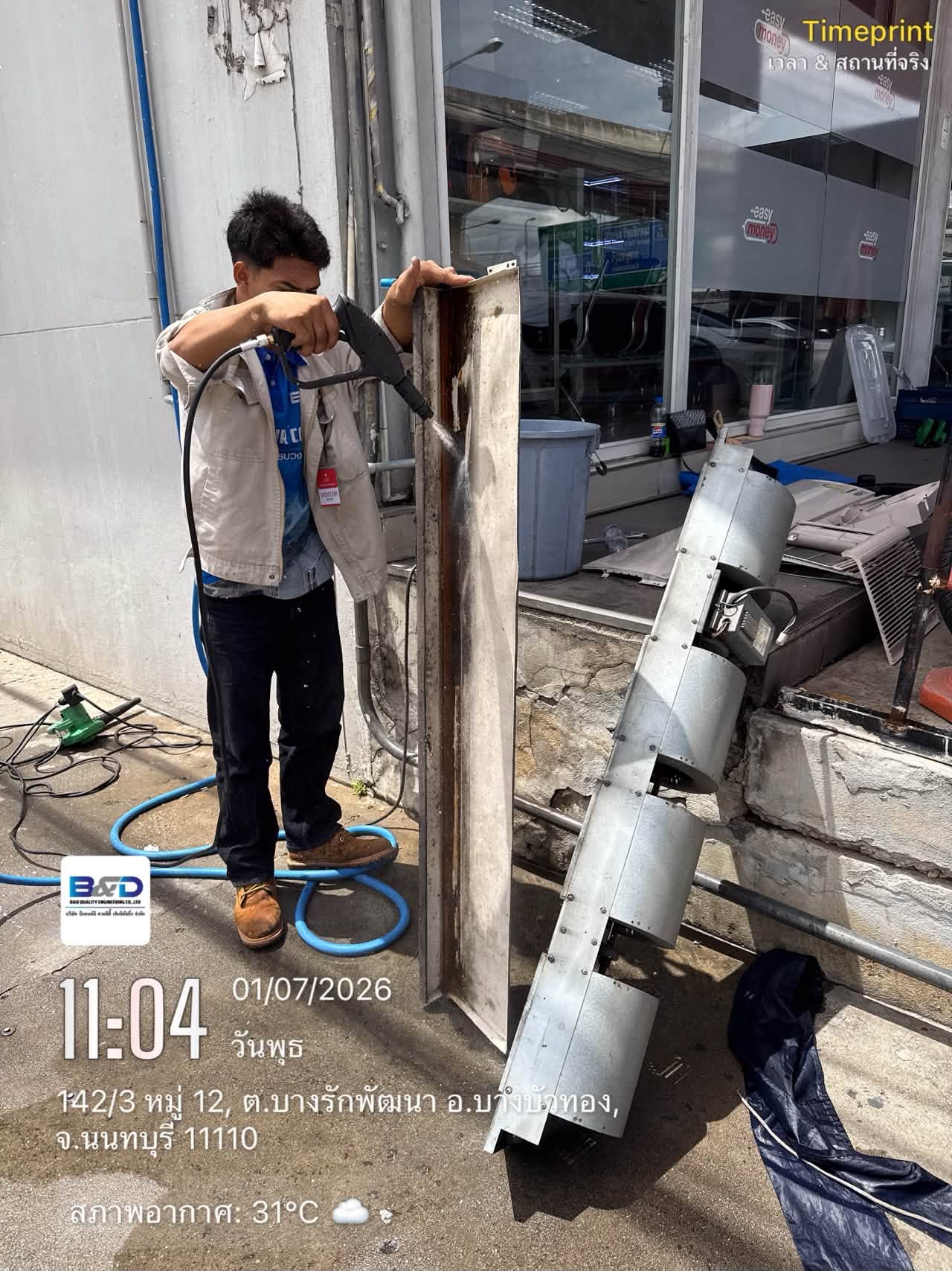 Technician checking a wall-mounted air conditioner